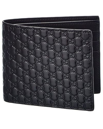 Gucci Embossed Leather Bifold Wallet - Black